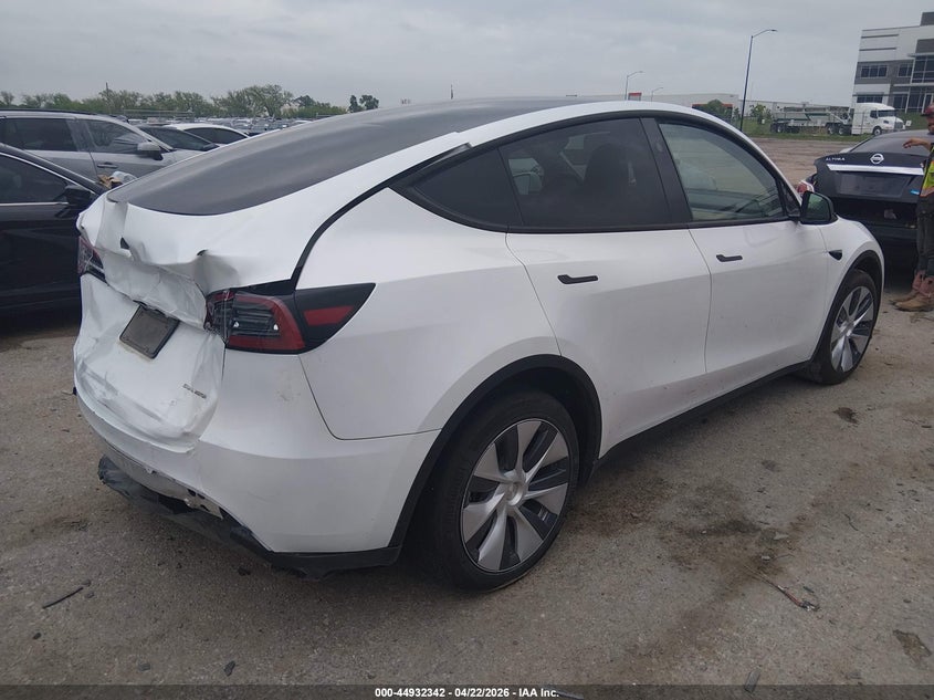 2024 Tesla Model y VIN 7SAYGDEE4RA257896 IAAI salvage auction — REAR END, Original (Texas), sold $13,000 on 2026-07-23 (photo 4)