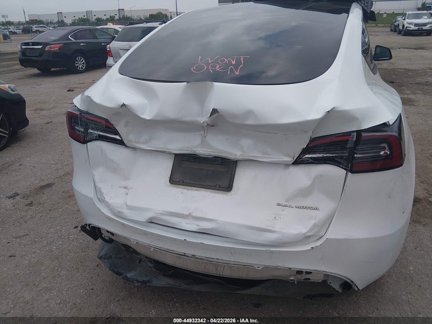 2024 Tesla Model y VIN 7SAYGDEE4RA257896 IAAI salvage auction — REAR END, Original (Texas), sold $13,000 on 2026-07-23 (photo 6)