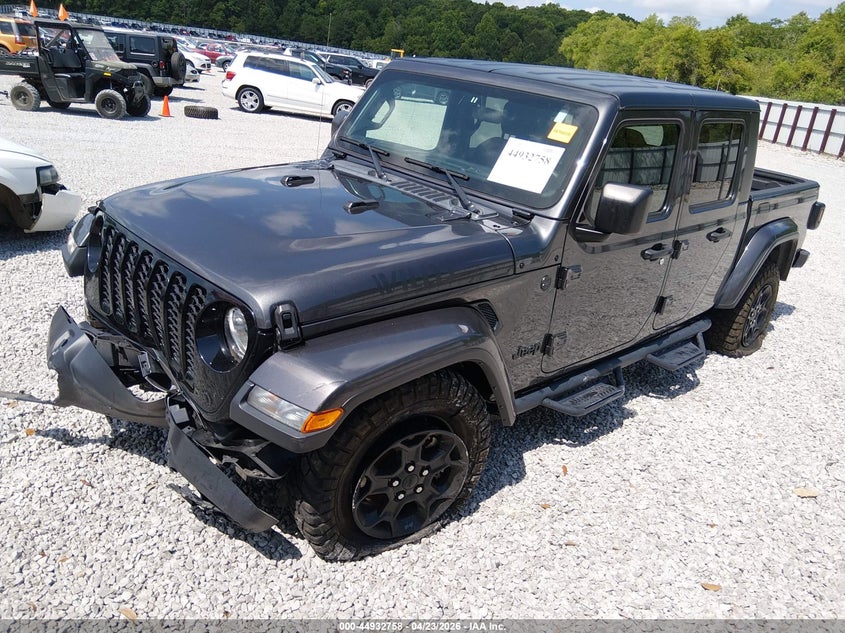 2023 Jeep Gladiator VIN 1C6HJTAG9PL574240 IAAI salvage auction — FRONT END, Salvage (Alabama), sold $9,675 on 2026-07-30 (photo 2)