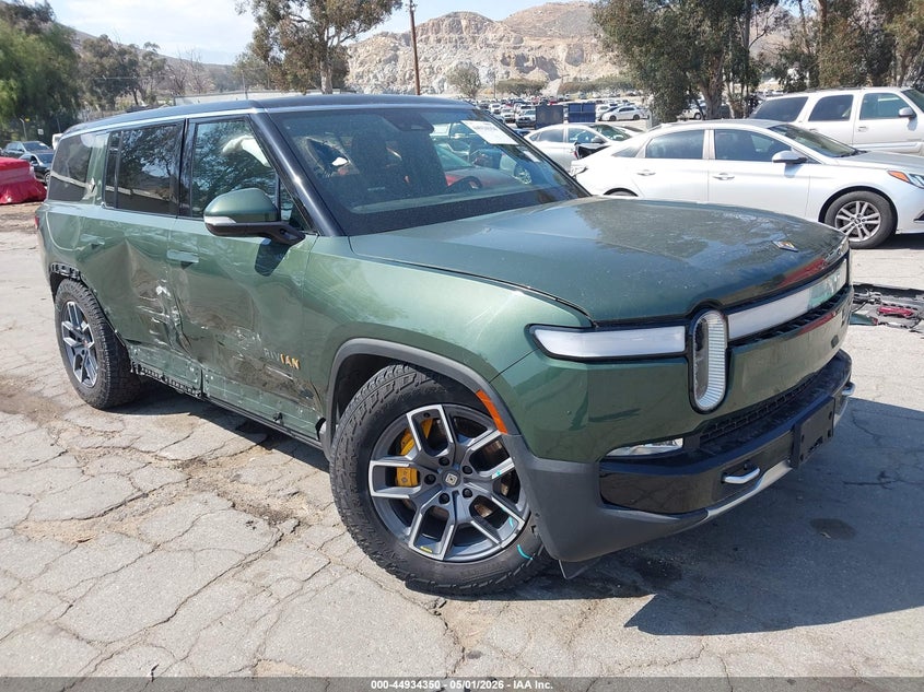 2023 Rivian R1s VIN 7PDSGABA1PN020926 IAAI salvage auction — RIGHT SIDE, Salvage (California), sold $19,250 on 2026-07-09 (photo 1)