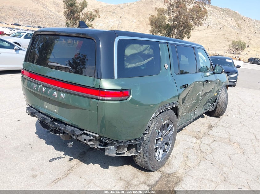 2023 Rivian R1s VIN 7PDSGABA1PN020926 IAAI salvage auction — RIGHT SIDE, Salvage (California), sold $19,250 on 2026-07-09 (photo 4)