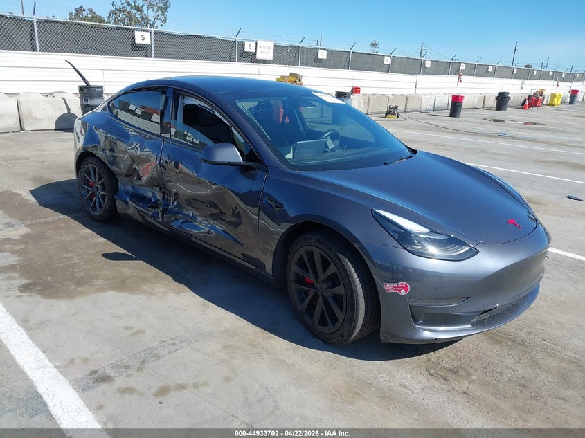 2023 Tesla Model 3 VIN 5YJ3E1EA6PF692010 IAAI salvage auction — SIDE, Salvage (Arizona), sold $4,750 on 2026-07-10 (photo 1)