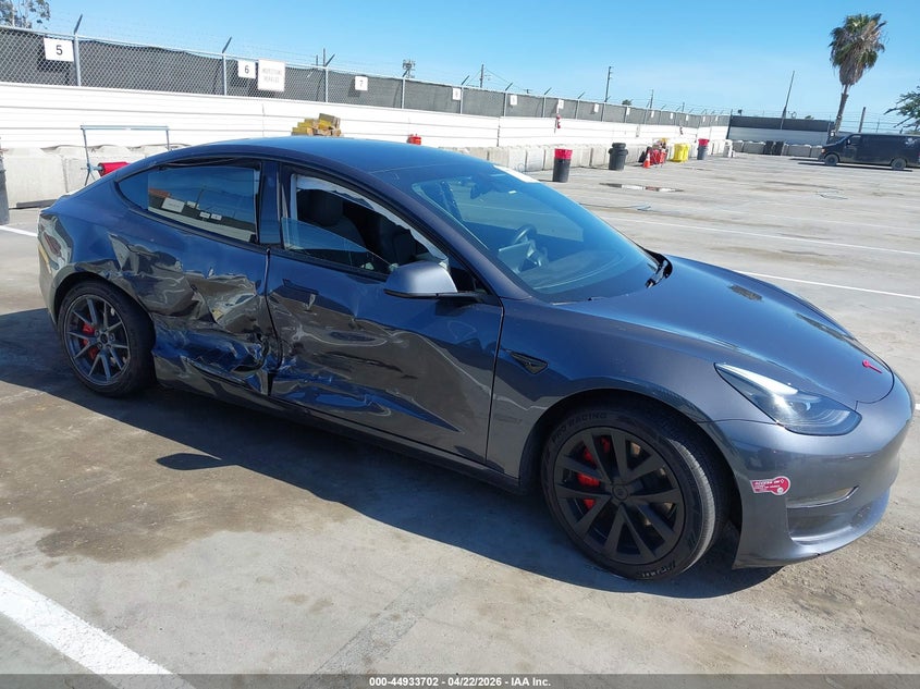 2023 Tesla Model 3 VIN 5YJ3E1EA6PF692010 IAAI salvage auction — SIDE, Salvage (Arizona), sold $4,750 on 2026-07-10 (photo 6)