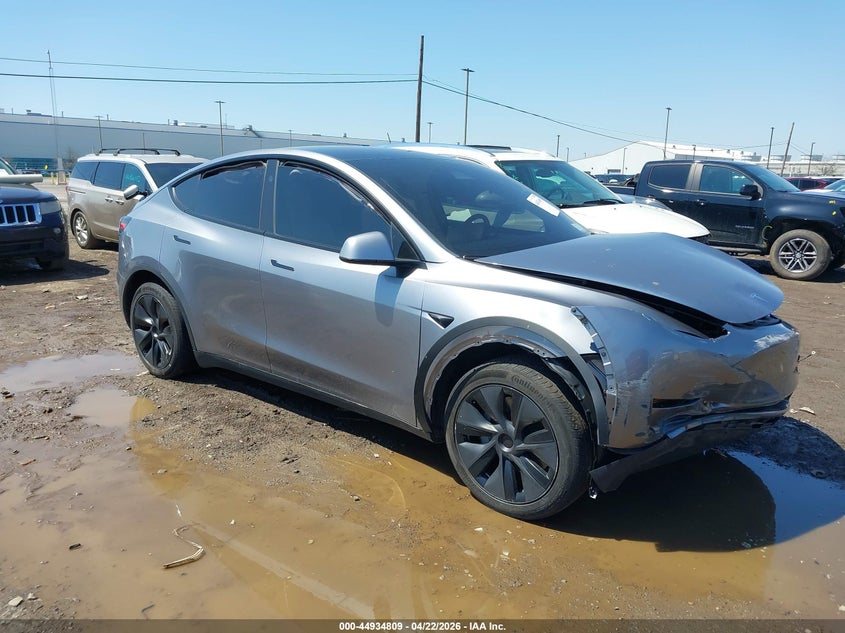 2025 Tesla Model y VIN 7SAYGDEE1SF297457 IAAI salvage auction — FRONT END, Salvage Title, sold $13,100 on 2026-07-23 (photo 1)
