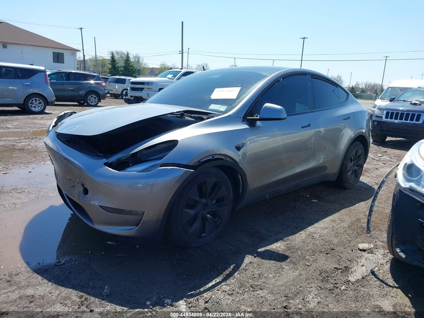 2025 Tesla Model y VIN 7SAYGDEE1SF297457 IAAI salvage auction — FRONT END, Salvage Title, sold $13,100 on 2026-07-23 (photo 2)