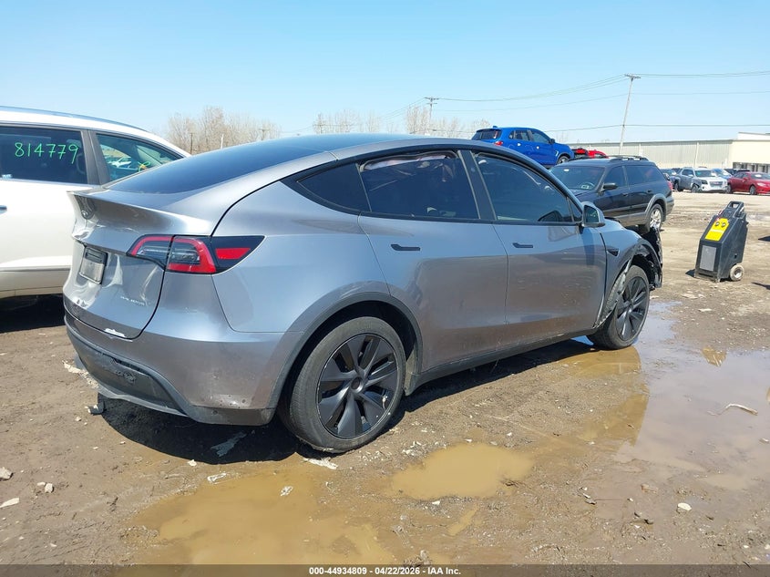 2025 Tesla Model y VIN 7SAYGDEE1SF297457 IAAI salvage auction — FRONT END, Salvage Title, sold $13,100 on 2026-07-23 (photo 4)