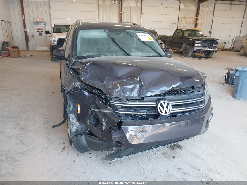 2016 Volkswagen Tiguan VIN WVGBV7AX4GW535981 IAAI salvage auction — BIO HAZARD, Salvage (Idaho), sold $600 on 2026-07-14 (photo 6)