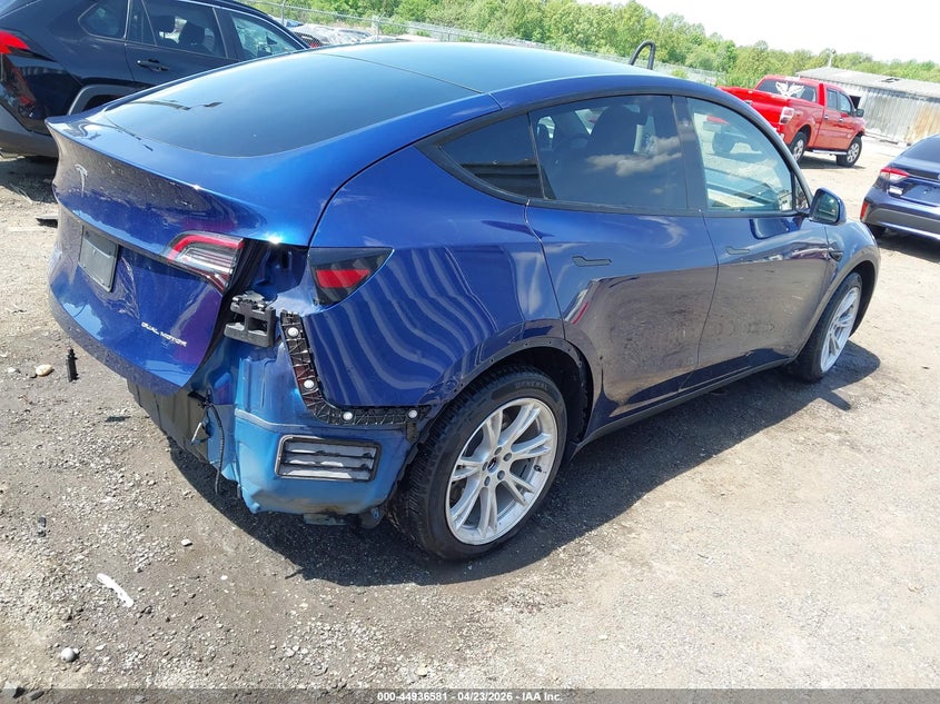 2022 Tesla Model y VIN 7SAYGDEE5NA005049 IAAI salvage auction — REAR END, Salvage Title, sold $11,150 on 2026-07-20 (photo 4)