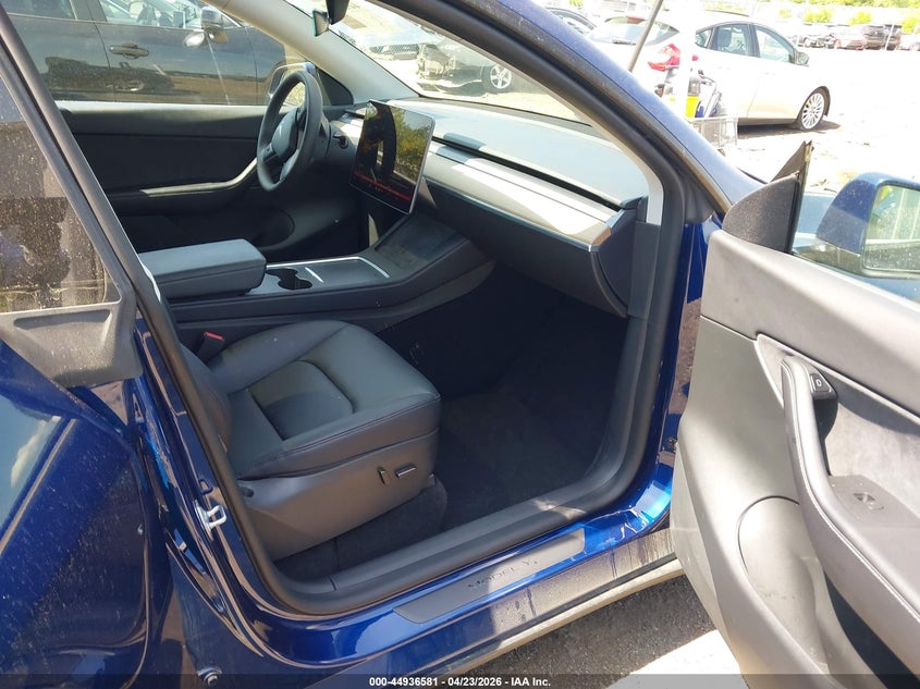 2022 Tesla Model y VIN 7SAYGDEE5NA005049 IAAI salvage auction — REAR END, Salvage Title, sold $11,150 on 2026-07-20 (photo 5)