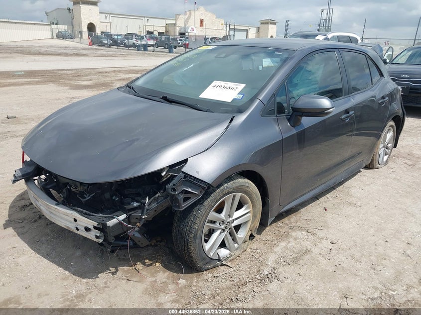 2022 Toyota Corolla VIN JTND4MBE2N3149954 IAAI salvage auction — FRONT & REAR, Original (Texas), sold $3,250 on 2026-07-13 (photo 2)