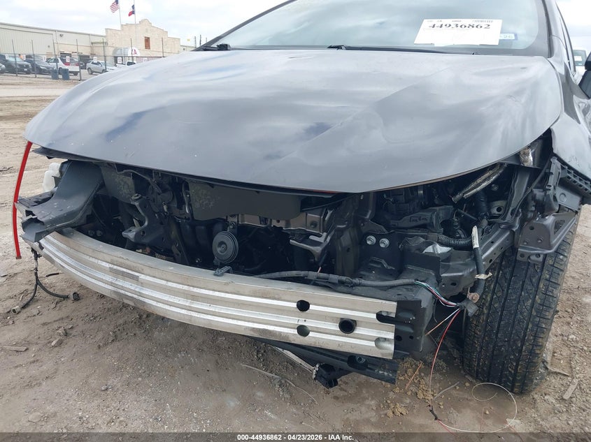 2022 Toyota Corolla VIN JTND4MBE2N3149954 IAAI salvage auction — FRONT & REAR, Original (Texas), sold $3,250 on 2026-07-13 (photo 6)