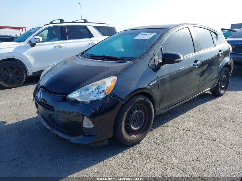 2014 Toyota Prius c VIN JTDKDTB37E1565255 IAAI salvage auction — RIGHT SIDE, Salvage (California), sold $850 on 2026-07-09 (photo 2)