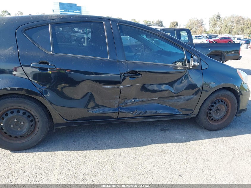 2014 Toyota Prius c VIN JTDKDTB37E1565255 IAAI salvage auction — RIGHT SIDE, Salvage (California), sold $850 on 2026-07-09 (photo 6)