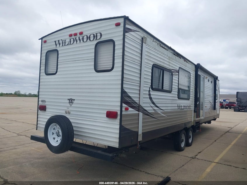 2014 Wildwood Other VIN 4X4TWDN23FM054269 IAAI salvage auction — STORM DAMAGE, Salvage (Mississippi), sold $25 on 2026-07-29 (photo 4)