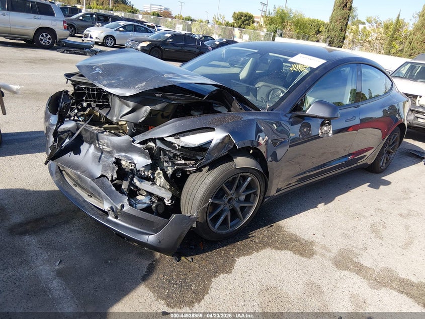 2023 Tesla Model 3 VIN 5YJ3E1EAXPF411889 IAAI salvage auction — FRONT END, Salvage Title, sold $5,400 on 2026-07-23 (photo 2)