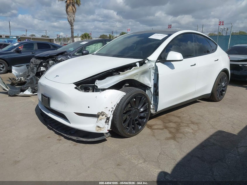2022 Tesla Model y VIN 7SAYGDEF4NF523875 IAAI salvage auction — LEFT FRONT, Salvage (Arizona), sold $11,500 on 2026-07-30 (photo 2)