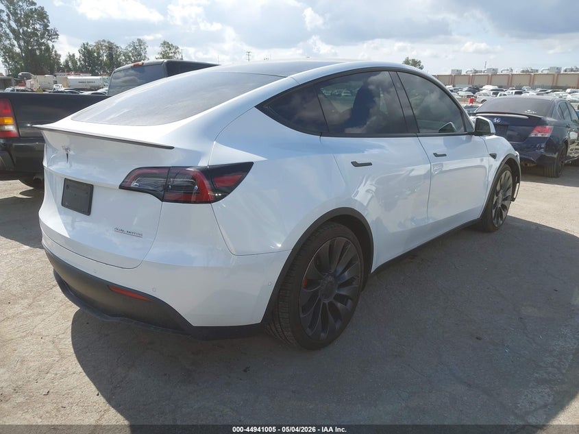 2022 Tesla Model y VIN 7SAYGDEF4NF523875 IAAI salvage auction — LEFT FRONT, Salvage (Arizona), sold $11,500 on 2026-07-30 (photo 4)