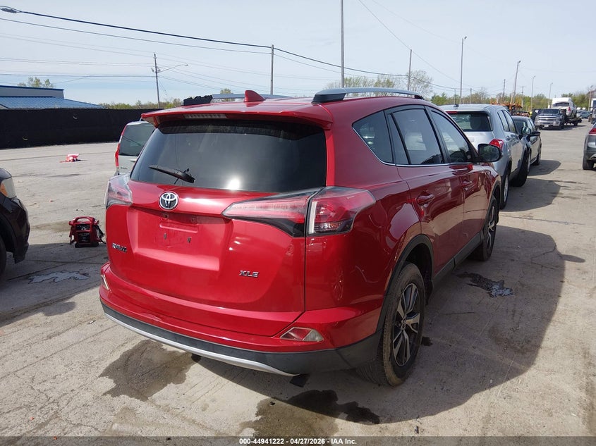 2016 Toyota Rav 4 VIN JTMWFREV5GJ075542 IAAI salvage auction — HAIL, Salvage (Idaho), sold $4,750 on 2026-07-28 (photo 4)