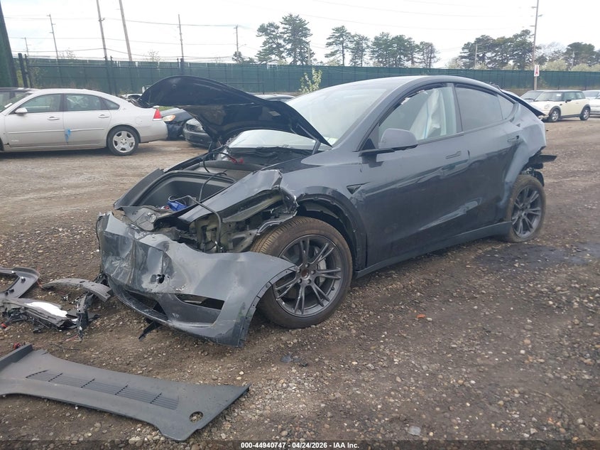 2025 Tesla Model y VIN 7SAYGDED8SA369646 IAAI salvage auction — FRONT & REAR, Salvage Title, sold $3,300 on 2026-07-07 (photo 2)