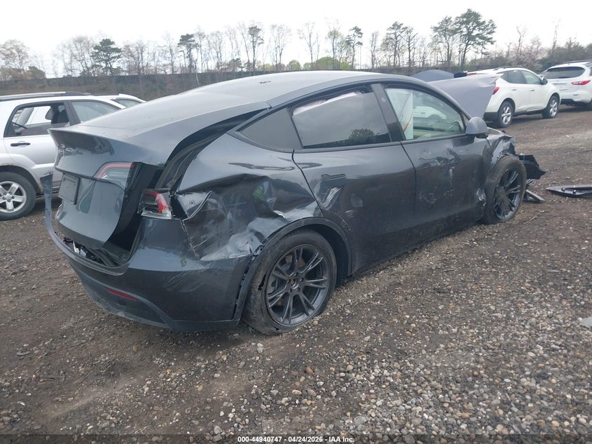 2025 Tesla Model y VIN 7SAYGDED8SA369646 IAAI salvage auction — FRONT & REAR, Salvage Title, sold $3,300 on 2026-07-07 (photo 4)