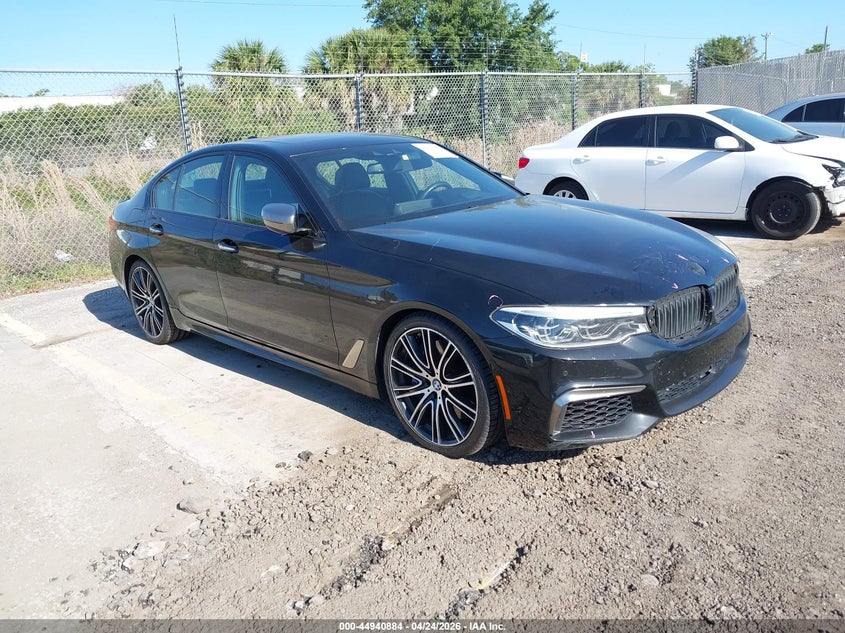 2018 BMW 5er VIN WBAJB9C51JB035160 IAAI salvage auction — LEFT SIDE, Rebuildable (Florida), sold $10,500 on 2026-07-08 (photo 1)