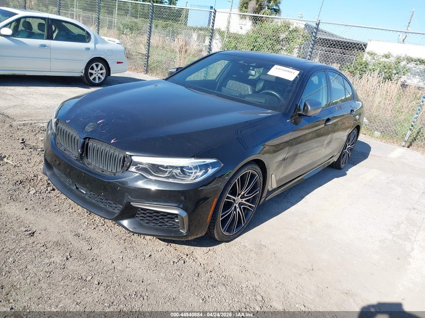 2018 BMW 5er VIN WBAJB9C51JB035160 IAAI salvage auction — LEFT SIDE, Rebuildable (Florida), sold $10,500 on 2026-07-08 (photo 2)