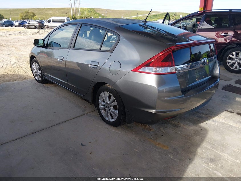 2012 Honda Insight VIN JHMZE2H72CS001700 IAAI salvage auction — NORMAL WEAR, Salvage Title, sold $350 on 2026-07-21 (photo 3)