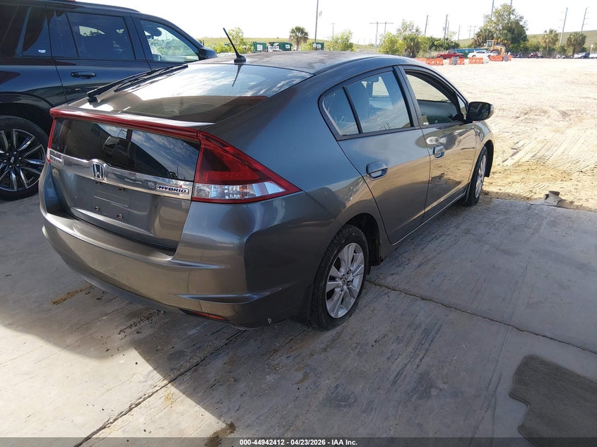 2012 Honda Insight VIN JHMZE2H72CS001700 IAAI salvage auction — NORMAL WEAR, Salvage Title, sold $350 on 2026-07-21 (photo 4)