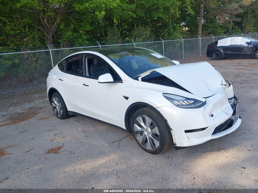 2023 Tesla Model y VIN 7SAYGDEE8PA056094 IAAI salvage auction — FRONT END, Salvage Title, sold $11,300 on 2026-07-12 (photo 1)