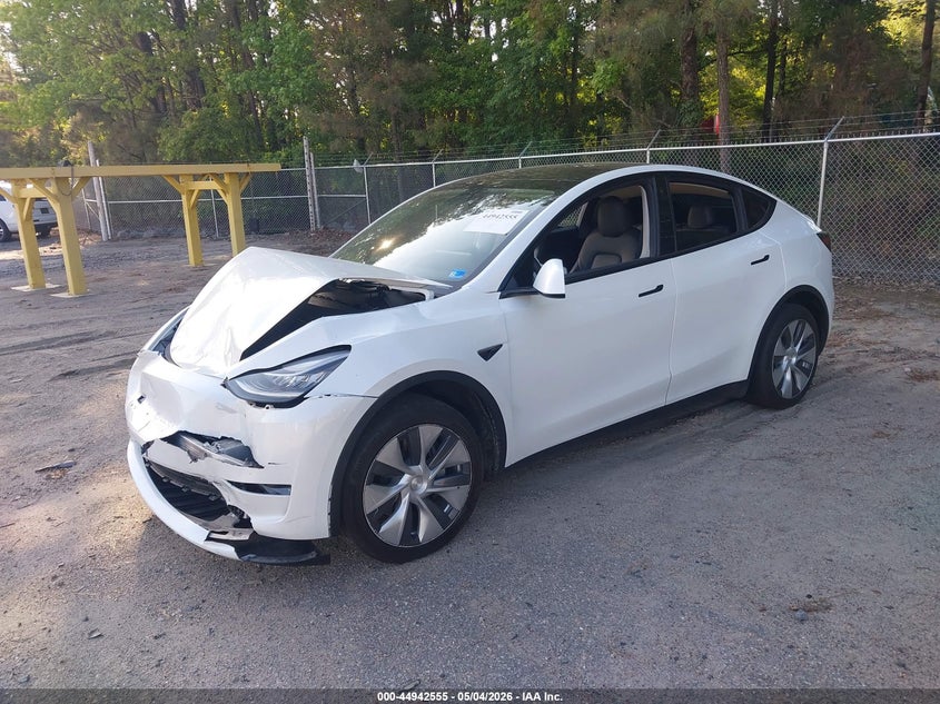 2023 Tesla Model y VIN 7SAYGDEE8PA056094 IAAI salvage auction — FRONT END, Salvage Title, sold $11,300 on 2026-07-12 (photo 2)