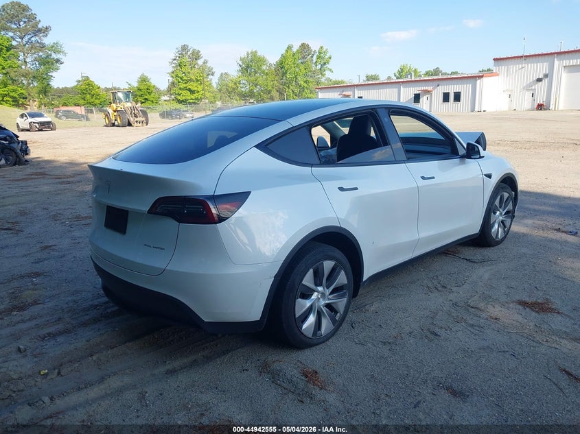 2023 Tesla Model y VIN 7SAYGDEE8PA056094 IAAI salvage auction — FRONT END, Salvage Title, sold $11,300 on 2026-07-12 (photo 4)