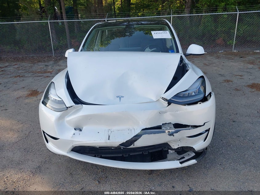 2023 Tesla Model y VIN 7SAYGDEE8PA056094 IAAI salvage auction — FRONT END, Salvage Title, sold $11,300 on 2026-07-12 (photo 6)