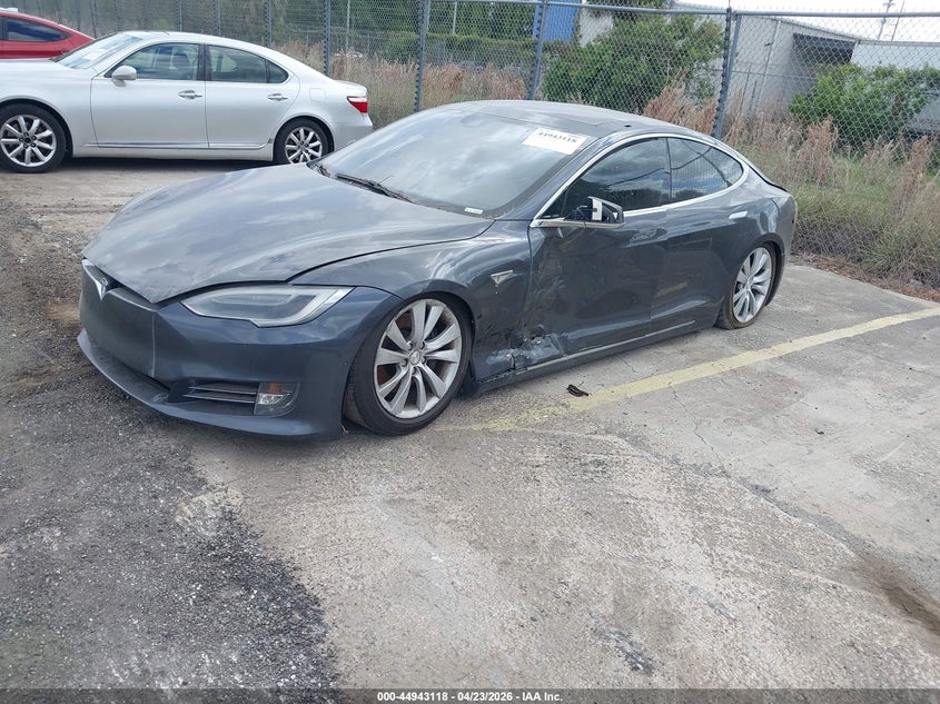 2016 Tesla Model s VIN 5YJSA1E29GF145331 IAAI salvage auction — LEFT SIDE, Clear (Florida), sold $2,100 on 2026-07-08 (photo 2)
