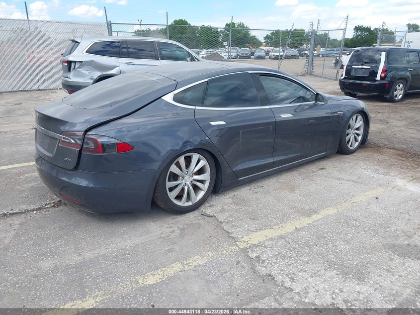 2016 Tesla Model s VIN 5YJSA1E29GF145331 IAAI salvage auction — LEFT SIDE, Clear (Florida), sold $2,100 on 2026-07-08 (photo 4)
