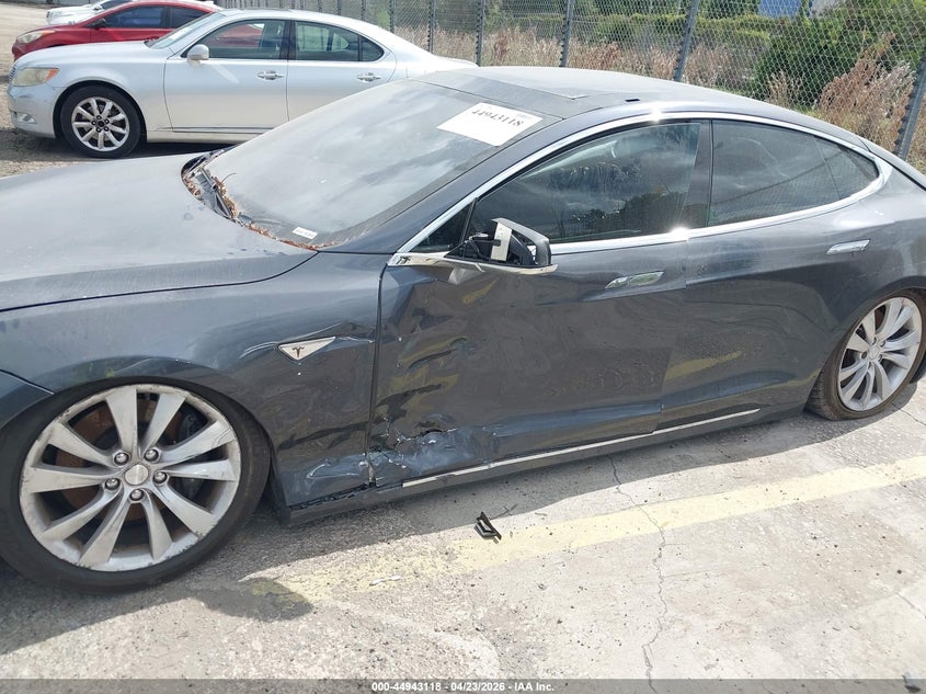 2016 Tesla Model s VIN 5YJSA1E29GF145331 IAAI salvage auction — LEFT SIDE, Clear (Florida), sold $2,100 on 2026-07-08 (photo 6)