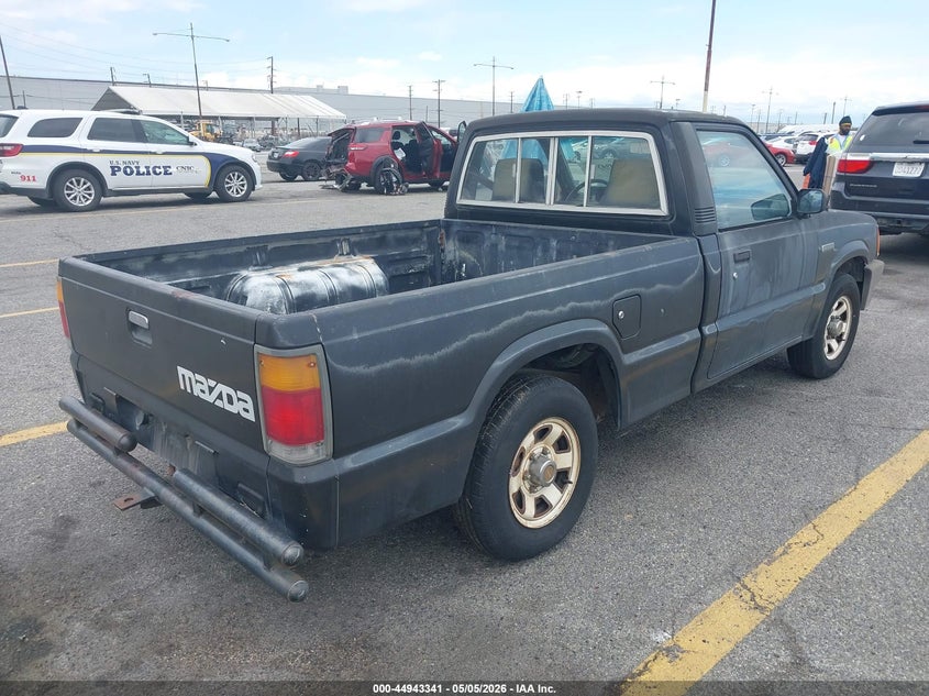 1988 Mazda B2200 VIN JM2UF1132J0329780 IAAI salvage auction — NORMAL WEAR, Clear - Dealer Only (California), sold $125 on 2026-07-21 (photo 4)