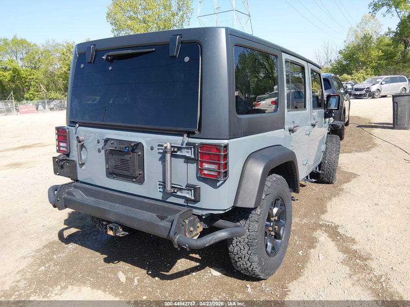 2015 Jeep Wrangler / VIN 1C4BJWDG9FL773444 IAAI salvage auction — ROLLOVER, Clear (Indiana), sold $3,050 on 2026-08-03 (photo 4)