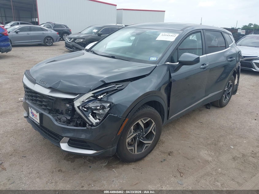 2023 Kia Sportage VIN KNDPUCAF6P7166130 IAAI salvage auction — FRONT & REAR, Salvage Title, sold $3,150 on 2026-07-10 (photo 2)