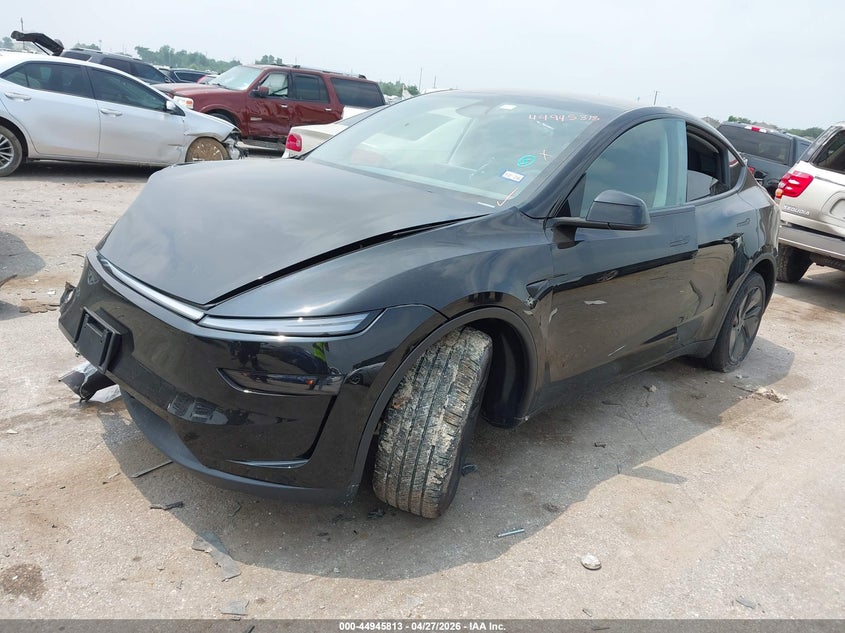 2026 Tesla Model y VIN 7SAYGDED7TA495045 IAAI salvage auction — RIGHT FRONT, Original (Texas), sold $17,350 on 2026-07-23 (photo 2)