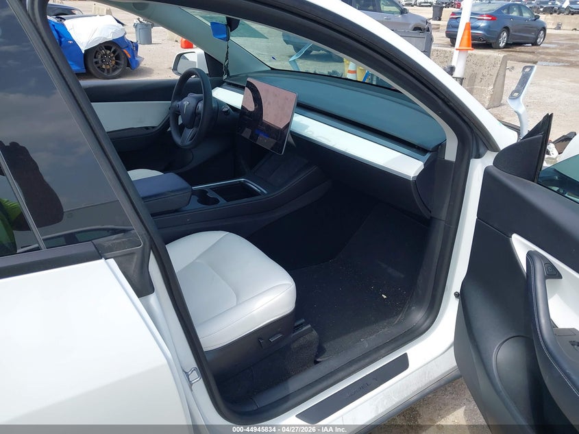 2022 Tesla Model y VIN 7SAYGAEE6NF388775 IAAI salvage auction — FRONT END, Salvage Title, sold $10,200 on 2026-07-16 (photo 5)