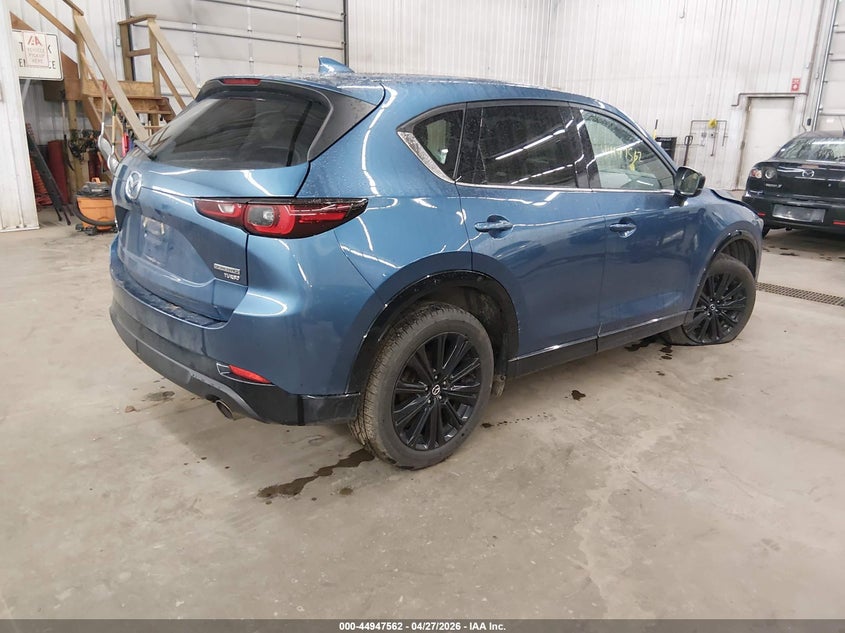 2023 Mazda Cx-5 VIN JM3KFBAY9P0121294 IAAI salvage auction — LEFT FRONT, Salvage (Minnesota), sold $5,750 on 2026-07-21 (photo 4)