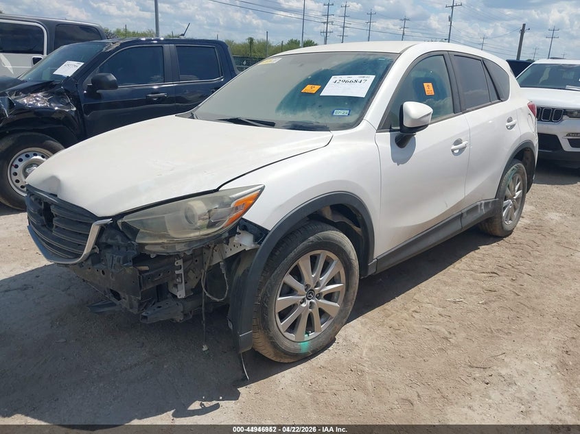 2016 Mazda Cx-5 VIN JM3KE2CY2G0688334 IAAI salvage auction — FRONT & REAR, Salvage Title, sold $2,250 on 2026-08-03 (photo 2)
