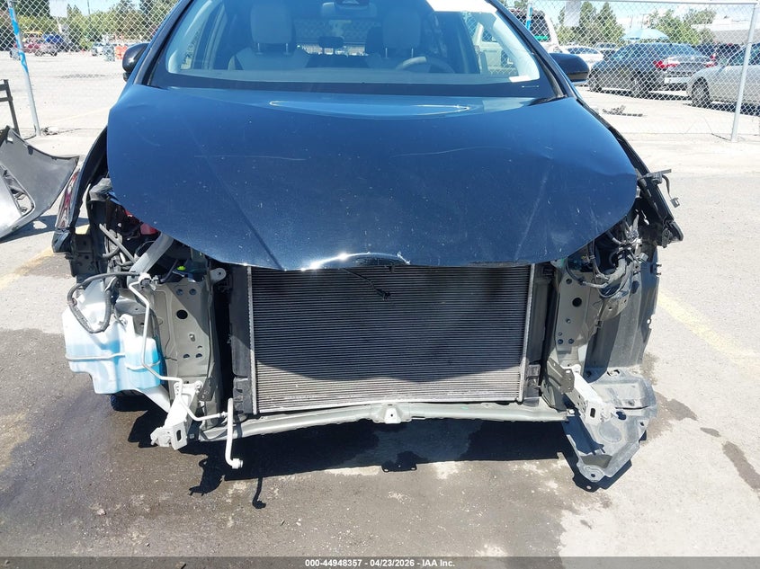 2021 Toyota Prius VIN JTDKAMFU3M3134593 IAAI salvage auction — FRONT & REAR, Wait Title, sold $6,150 on 2026-07-13 (photo 6)