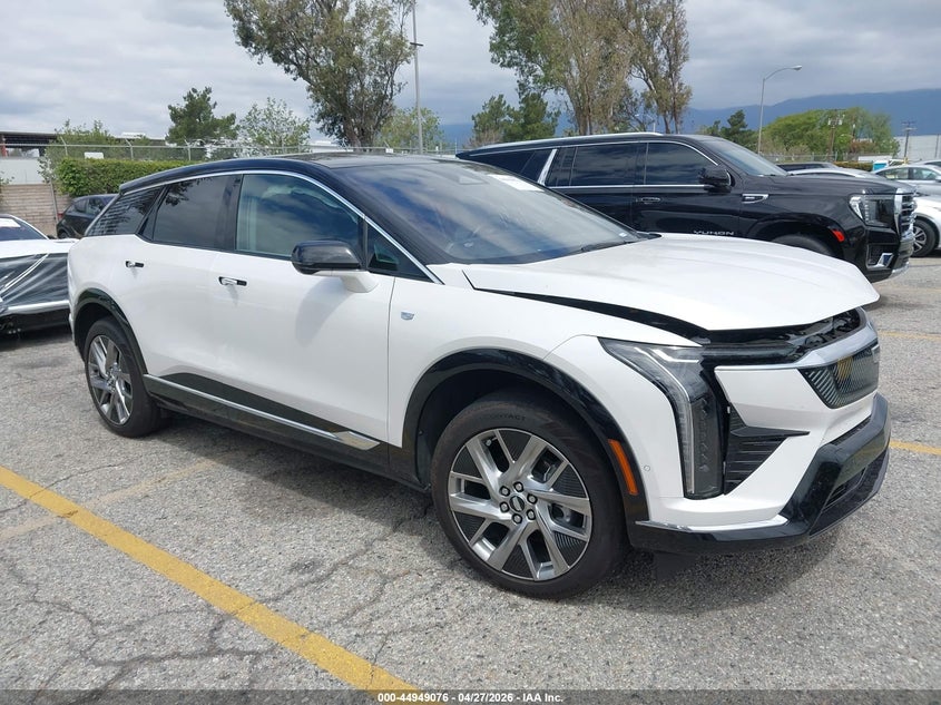2025 Cadillac Optiq VIN 3GYK3BMR8SS189992 IAAI salvage auction — LEFT SIDE, Salvage Title, sold $8,500 on 2026-07-14 (photo 1)