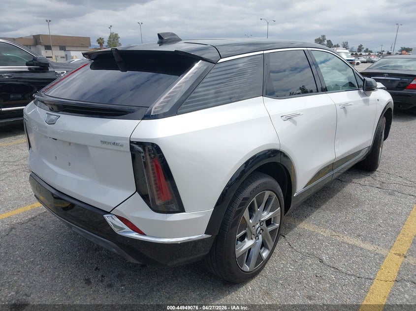 2025 Cadillac Optiq VIN 3GYK3BMR8SS189992 IAAI salvage auction — LEFT SIDE, Salvage Title, sold $8,500 on 2026-07-14 (photo 4)