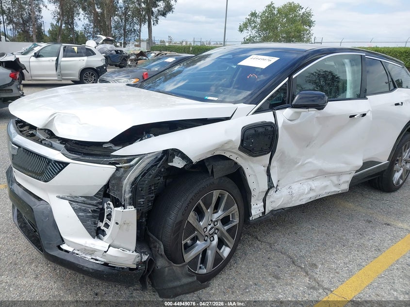 2025 Cadillac Optiq VIN 3GYK3BMR8SS189992 IAAI salvage auction — LEFT SIDE, Salvage Title, sold $8,500 on 2026-07-14 (photo 6)