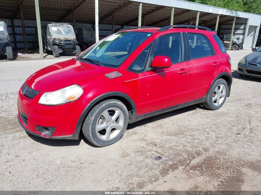 2009 Suzuki Sx4 VIN JS2YB413895101032 IAAI salvage auction — SIDE, Salvage (Idaho), sold $550 on 2026-08-02 (photo 2)