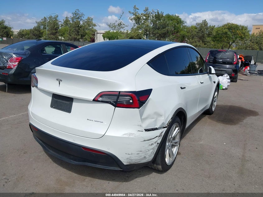 2021 Tesla Model y VIN 5YJYGAEE4MF144831 IAAI salvage auction — REAR END, Salvage (California), sold $9,600 on 2026-10-16 (photo 6)