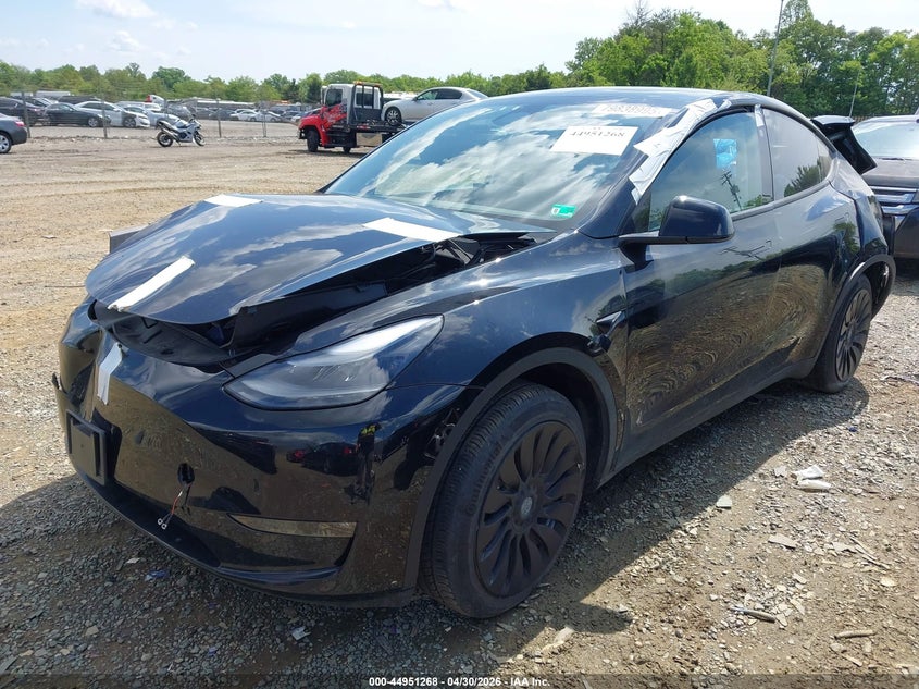 2023 Tesla Model y VIN 7SAYGDEE8PF834963 IAAI salvage auction — FRONT & REAR, Salvage (Virginia), sold $1,150 on 2026-07-27 (photo 2)