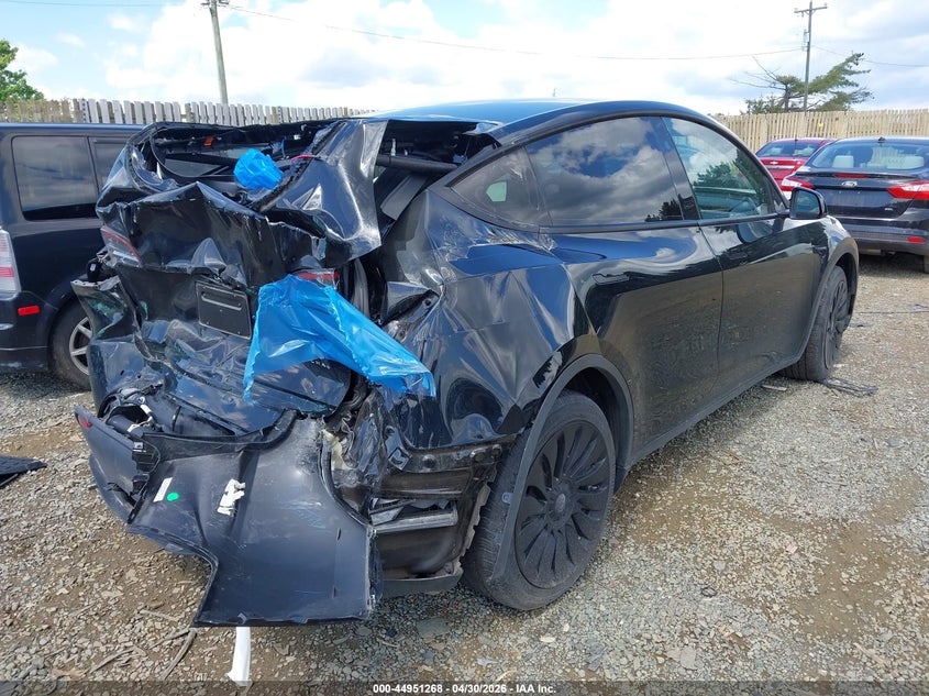 2023 Tesla Model y VIN 7SAYGDEE8PF834963 IAAI salvage auction — FRONT & REAR, Salvage (Virginia), sold $1,150 on 2026-07-27 (photo 4)